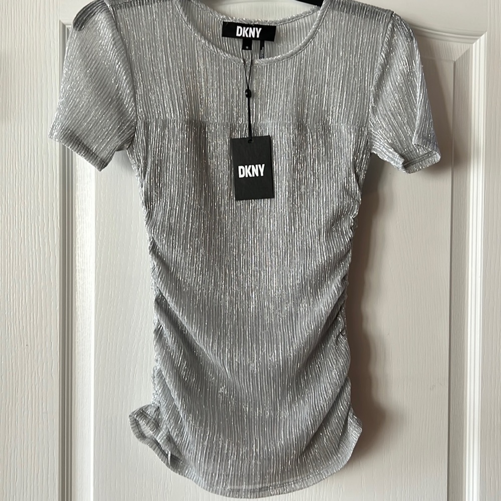 NWT DKNY gorgeous silver shimmer top. Perfect for the holidays . Women’s XS.
